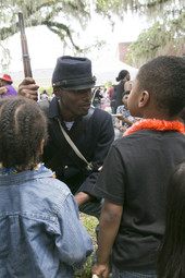 Union soldier reenactor with children during the Emancipation Day Celebration at the Knott House Museum in Tallahassee.