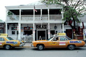 Taxicabs in front of Rick's Bar at 202 Duval Street - Key West, Florida.