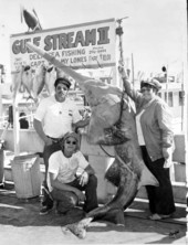 Group gathered with sawfish - Key West, Florida.