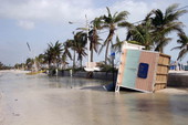 Shack blown off beach on to sidewalk at Smathers Beach..