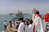 Shrimp boat "Miss To Nicey" passing Mallory Square during shrimp fleet blessing ceremony - Key West, Florida.