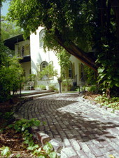 Walkway leading to the rear entrance of the Ernest Hemingway house museum - Key West, Florida.