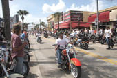 Motorcycles driving on Main Street during Bike Week 2006 - Daytona Beach, Florida.