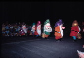 Snow White's dwarves in the Main Street Electrical Parade at the Magic Kingdom - Orlando, Florida.
