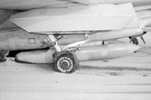 Close up view showing the starboard main mount landing gear of an F-14 Tomcat Navy fighter following an emergency landing on NAS Key West runway 3.