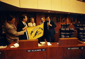 Rep. Villalobos and other members displaying replica of a flag - Tallahassee, Florida.