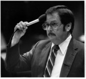 Rep. Everett Kelly presses the microphone to his forehead - Tallahassee, Florida.