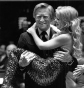 Florida State Senator Dempsey Barron carrying a Weeki Wachee Springs waterpark mermaid during the 1983 session in Tallahassee, Florida.
