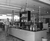 Unidentified men in the laboratory .