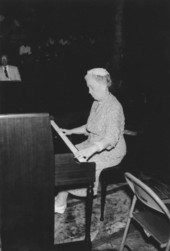 Mrs. Louis Tatom, of Gainesville, playing piano - White Springs, Florida