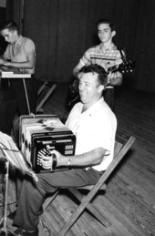 Joe Tomazin of the University of Florida playing an accordion with the Kersey brothers - White Springs, Florida