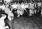 Crowd watching as Archie Lee plays the dulcimer- White Springs, Florida
