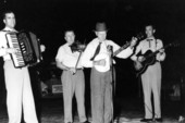 Musicians play with banjoist "Uncle Frank"- White Springs, Florida