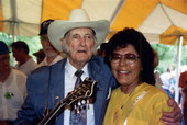 Bill Monroe with unidentified woman at the Florida Folk Festival - White Springs, Florida .