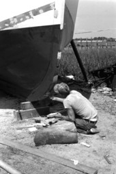 Donald Herrin "grinding" the hull- Jacksonville, Florida.