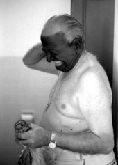 Juan "Bolito" Landa putting on "black face" for a Cuban variety show - Miami, Florida.
