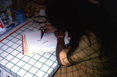 Cecilia Campos drawing a Mehandi design - Miami, Florida.