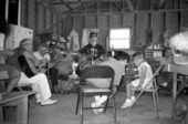 Morgan family celebrating an ethnic cracker calendar custom with music - White Springs, Florida.