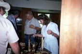 Bobby Johns and students looking at wood carvings they made at Johns' cane making workshop- White Springs, Florida