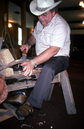 Bobby Johns carving wood at a cane making workshop- White Springs, Florida