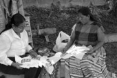 Miccosukee Indian Jennie Billie teaching apprentice Minnie Bert how to make Seminole/Miccosukee patchwork - Miccosukee Reservation, Florida