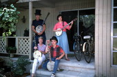 Group portrait of banjo player Dale Webber and apprentices Jason Pennypacker, Linda Fackeldey, and Melanie Robertson- Odessa, Florida