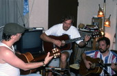 Blues guitarist Tampa Blue (L) teaching apprenctices Michael Dodge and Joseph Reina (R) how to play blues guitar - Tampa, Florida.