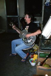 Tampa Blue playing slide blues guitar on a steel guitar- Tampa, Florida.