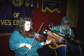 Fiddler Amy Cox performs while Gerry Cox accompanies on guitar- Miami, Florida