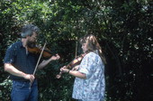 Home Grown String Band members Amy and Gerry Cox playing the fiddle- Fort Lauderdale, Florida.