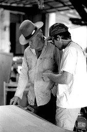 Glen Simmons and apprentice Donald Edwards building an Everglades skiff- Florida City, Florida.