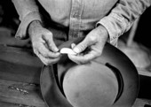 Alligator tooth from the brim of a wide-brimmed hat worn by glades skiff maker Glen Simmons- Florida City, Florida