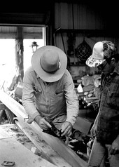 Glen Simmons and apprentice Donald Edwards building an Everglades skiff- Florida City, Florida.