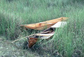 Glades skiffs made by Glen Simmons sitting in the water- Florida City, Florida