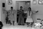 Nila Radhakrishnan (center) teaching apprentices Prema Menon (L) and Priya Menon East Indian dance- Dade City, Florida