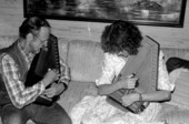 Autoharp player Charley Groth teaching apprentice Cheryl Belanger how to play the instrument- Tampa, Florida.