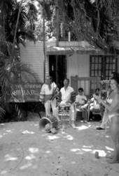 Cuban comparsa band members Hector Borroso and Buddy Chaver performing- Key West, Florida.