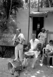 Cuban comparsa band members Hector Borroso and Buddy Chaver performing- Key West, Florida.