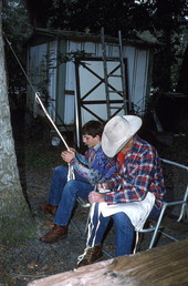 Cow whip maker George "Junior" Mills (r) and his apprentice J. Taylor Marcus at work - Okeechobee, Florida.