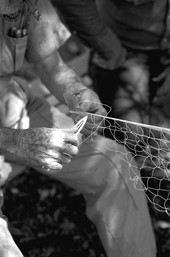 Max Dooley weaving a cast net - Lakeland, Florida.