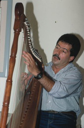 Jose Palmi playing harp