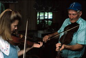 Trenda Slaughter being taught oldtime fiddling from Willie David Jones - Old Town, Florida