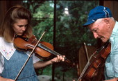 Trenda Slaughter learning oldtime fiddling from Willie David Jones - Old Town, Florida