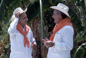 Cuban guajiro apprentice, Mario Brito, right, sings a decima to Meliton Perdomo - Medley, Florida