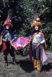 Jose Silva, right, and his apprentice Marvin Silva wearing the mandador costumes and holding the bull mask of the Nicaraguan Toro Huaco pageant.