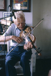 Finnish fiddler William Syralia being recorded at his home - Lake Worth, Florida.