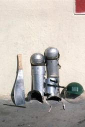 Machete, helmet, and leggings worn by cane cutters - Pahokee, Florida