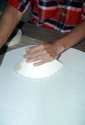 Sylvia Garcia making nose for Mickey Mouse head pinata - West Palm Beach, Florida.
