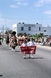 Palm Beach Pipes and Drums marching in St. Patrick's Day parade - Lake Worth, Florida.