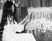 Lynn Bernstine practicing the craft of macrame at the Florida Folk Festival.